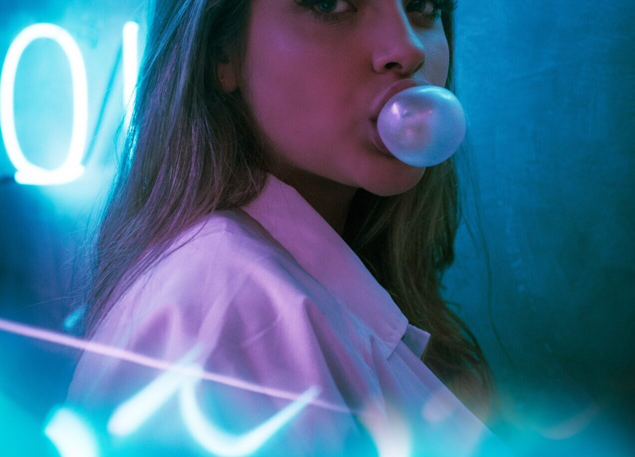 girl blowing gum